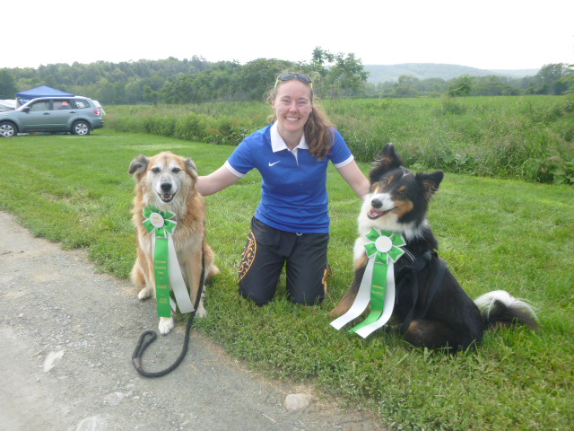 Katie, and Jonah and Chico with their ribbons.